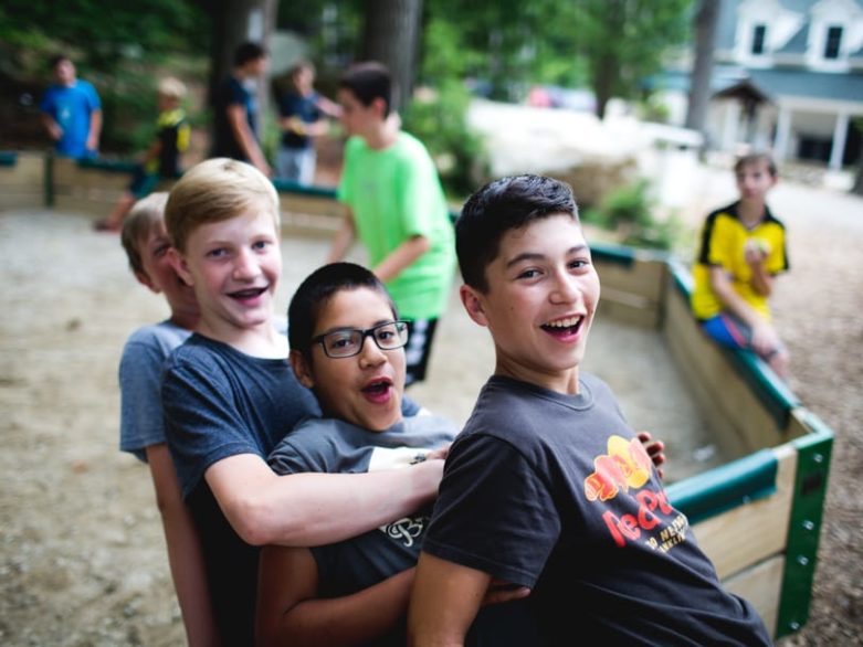 Boys hanging by gaga court