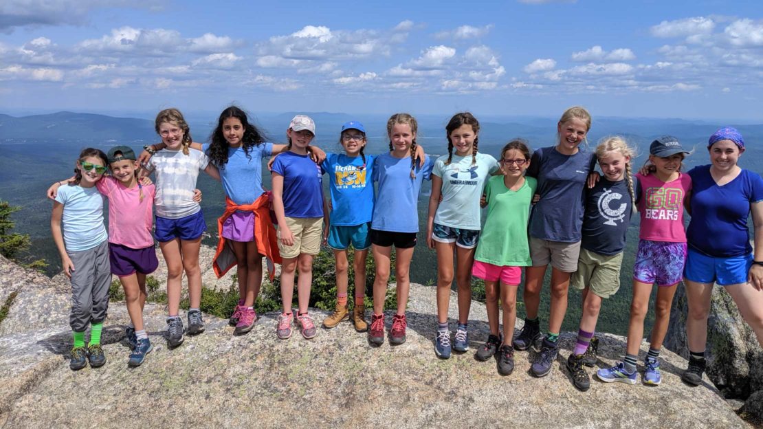 Group of campers on mountain summit