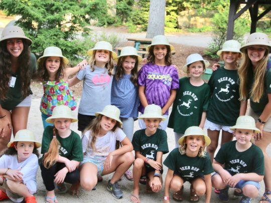 Deer Run explorers wearing white hats