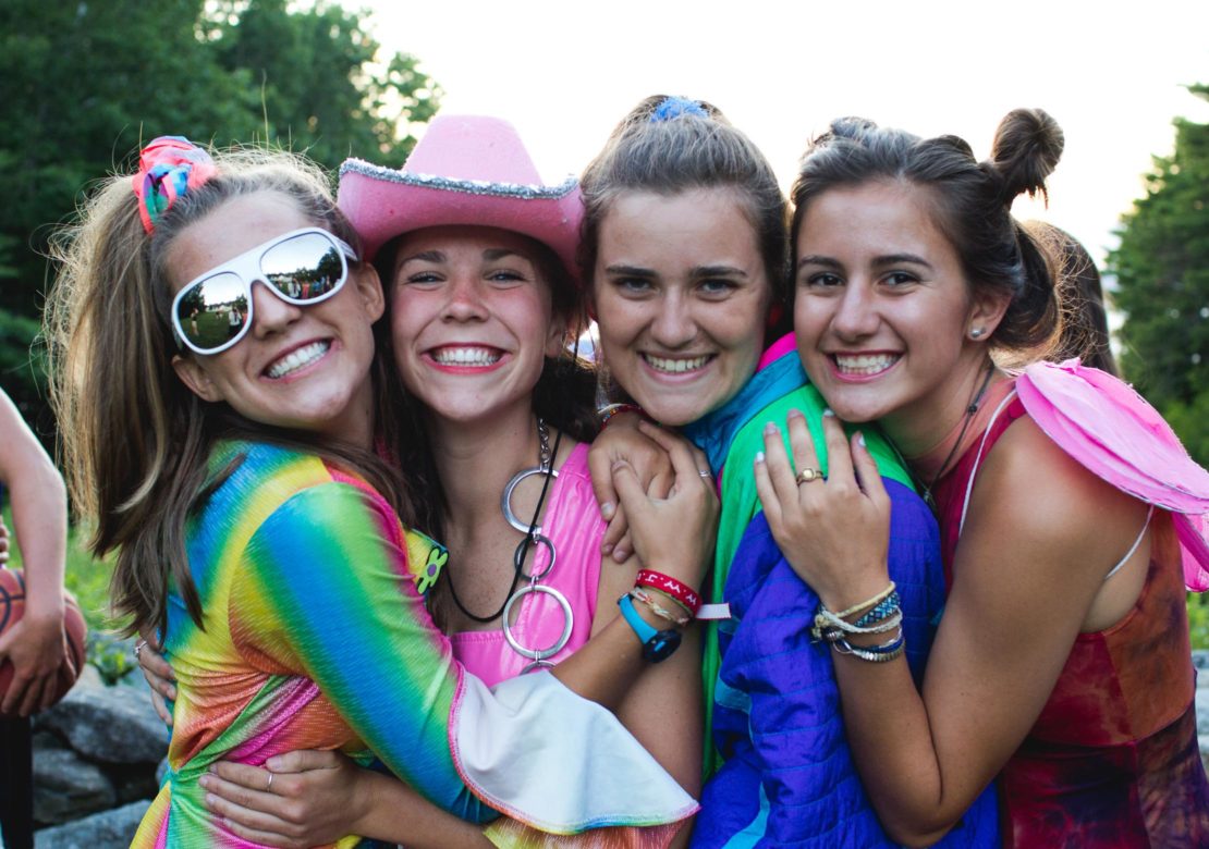 four girls wearing costumes on the Leadership Development Program