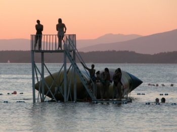 Girls on the dock and the blob at sunset