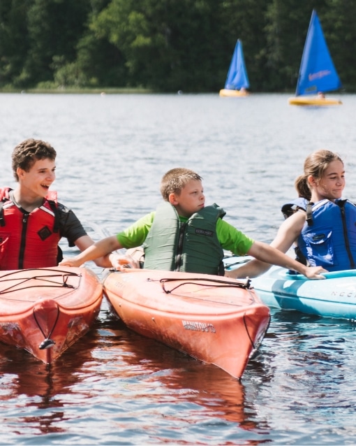 Three campers kayaking