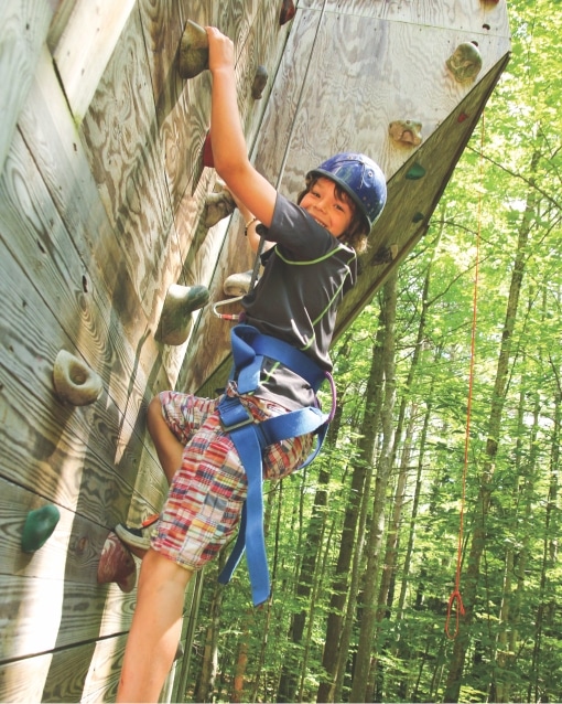 Camper on the climbing wall