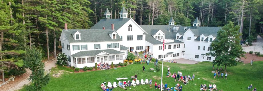 Aerial main building and alumni on lawn during alumni camp on Labor Day weekend